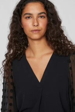 Vila Blusa con plumeti en mangas Negro Hot