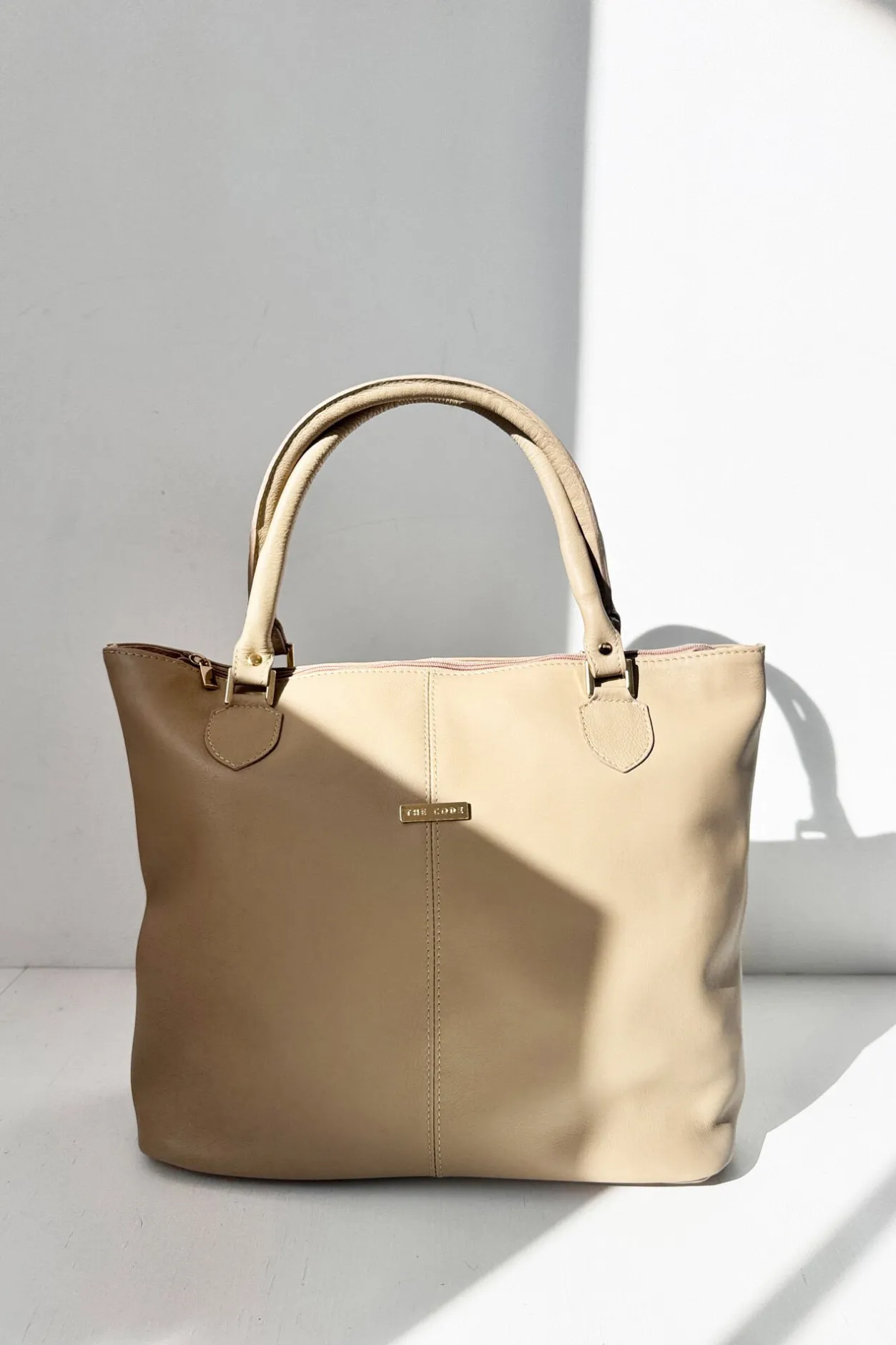 The Code Shopper Maria piel moca Arena Online