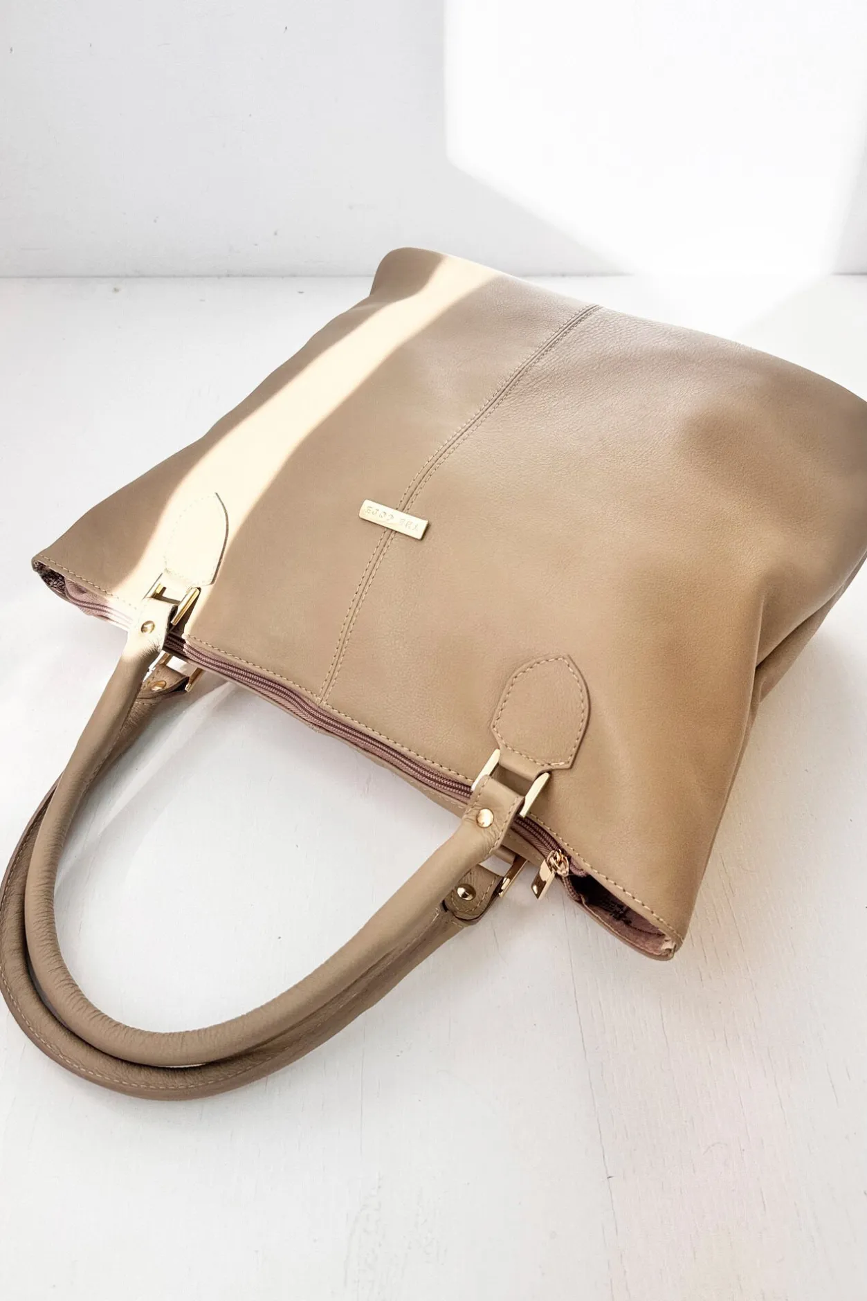 The Code Shopper Maria piel moca Arena Online